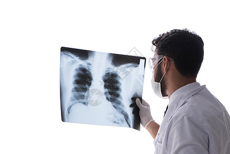 年轻医生在看白色孤立的X光图像保险谐振诊断保健考试x光放射科诊所展示治疗图片
