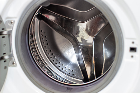 洗衣机干洗和清洁近身的桶子 在鼓内看到冲洗机琐事艺术卫生衣服器具洗衣店烘干机洗涤圆圈金属图片