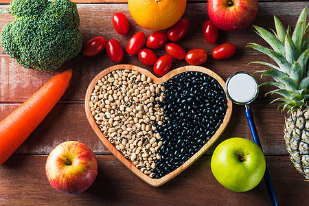 心盘和医生听诊器中的水果和蔬菜糖尿病食物木头食谱运动谷物处方疾病盘子心脏病学图片