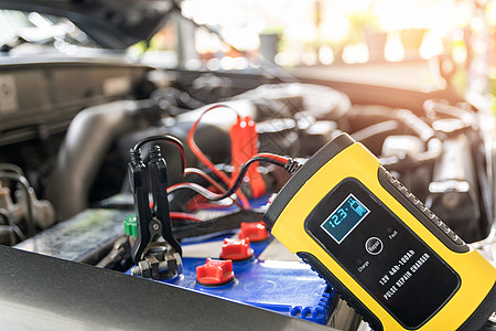 汽车充电器商业生产力量检查电池服务机器技术员车辆电压图片