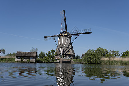 在著名的旅游景点 荷兰农村因风车而滑坡环境游客遗产场景场地农场蓝色世界历史性农业图片