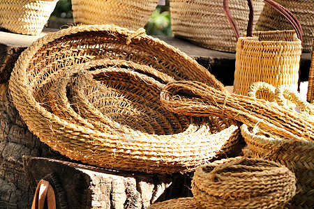 拉菲ElcheSpai 的传统工艺麻篮销售装饰乡村家具篮子织物稻草风格材料手工背景