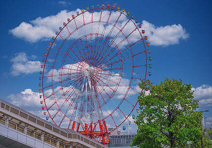 日本之轮旅行地标吸引力狂欢风景公园马赛克建筑学旋转天空图片