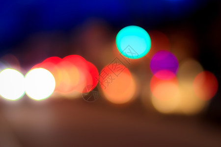 夜间汽车灯和灯灯灯的模糊灯光c背景耀斑场景灯笼运动圆圈城市运输景观头灯图片