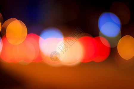 夜间汽车灯和灯灯灯的模糊灯光c背景路灯头灯运输运动城市场景夜生活街道耀斑图片