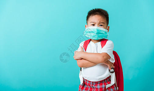 幼童幼儿园戴面罩 保护面具和书包教育快乐流感工作室学校孩子安全蓝色病菌感染图片