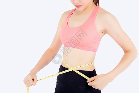 美丽又瘦又瘦的年轻女士 穿着薄腰带磁带女性腰部损失重量女孩减肥运动健身房测量图片