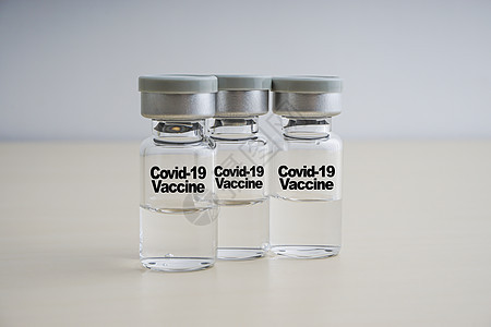 COVID19 VACCINE 含有木本底小瓶的VACCINE 文本药品治疗疫苗剂量注射工作液体疾病病人医院图片