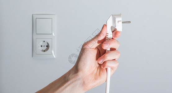 能源概念 插件 准备连接 白电缆和插座在模糊背景中连接器插头夹子力量反弹消耗成本效应活力可持续图片