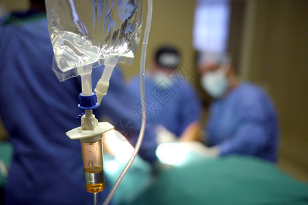 医院手术区心脏监测器和IV滴滴外科生活急诊室情况医生背景图片