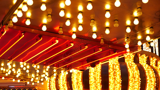 旧的 fasioned 电灯在夜间闪烁和发光 在美国拉斯维加斯闪闪发光的复古赌场装饰的抽象特写 弗里蒙特街上闪闪发光的复古风格灯图片