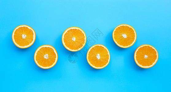 高维生素C 果汁和甜味 蓝底新鲜橙子水果维生素饮食排毒植物团体叶子皮肤橙色菠萝柠檬图片