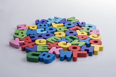 五颜六色的字母块随机散落在惠特学校拼写教育字体打字稿语法游戏知识阅读字母图片