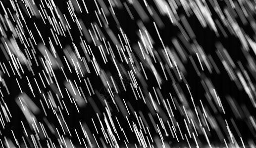 黑色背景上的水滴雨滴天气雨量倾盆大雨倒台火花灌溉运动流动淋浴图片