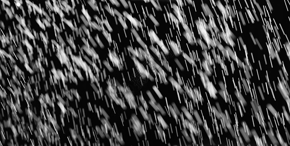 黑色背景上的水滴流动雨量天气飞沫倾盆大雨溪流倒台飞溅瀑布运动图片