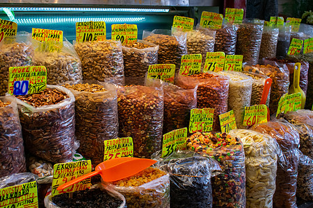 在墨西哥市场销售的袋装新坚果棕色花生健康饮食干果食物团体葡萄干饮食数字塑料图片
