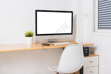 商务服务台上有白空白屏幕的计算机监视器CEB桌面植物技术键盘办公室家具互联网风格电脑职场图片