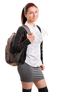 白色背包年轻女学生用背背包微笑背景