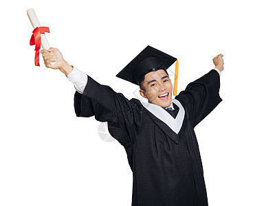 穿着黑色毕业礼服和显示文凭帽子的兴奋青年男子教育手势快乐成就证书男性推介会大学仪式成功图片