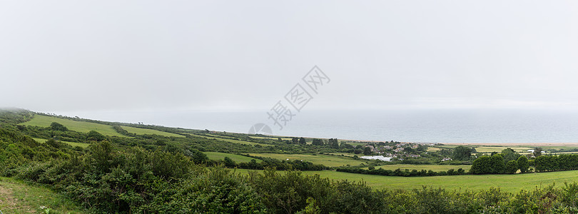 英国威茅斯附近的南多尔塞特海岸线 有草地 云层和深蓝海 全景和横幅地平线丘陵天空远足海洋悬崖环境季节沿海蓝色图片