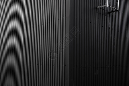 用作仓库或工厂外墙的黑色波纹铁皮 无缝波纹锌板金属铝立面的纹理 建筑学 金属质感线条床单技术建造材料控制板建筑背景图片