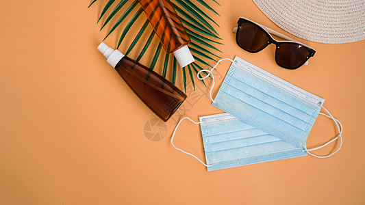 草沙帽 太阳镜 保护霜 医疗面罩 海滩附属品洗剂管子温泉包装防护面具保健草帽背景系数图片