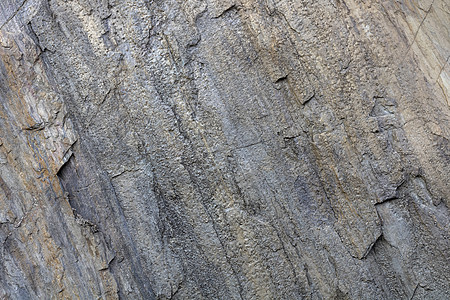 卡雷利岩石上沉积岩中岩层和裂缝的背景和纹理图片