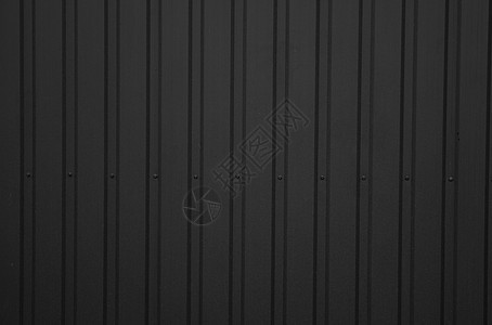 用作仓库或工厂外墙的黑色波纹铁皮 无缝波纹锌板金属铝立面的纹理 建筑学 金属质感技术材料建造床单线条建筑控制板背景图片