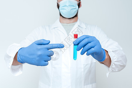 医生分析新药 科学家介绍医学研究 实验室实验想法 讲课 解释科学问题蓝色医院技术员男人液体化学家微生物学男性烧杯防护图片
