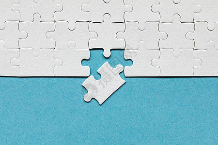 白色拼图块 填写拼图块 用缺失的部分完成拼图游戏 一个折叠的白色七巧板的片段答案测验概念工作游戏商业战略合作知识挑战图片