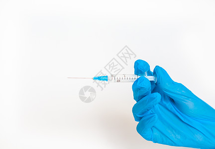 医生带着白种背景的注射针头 用的是疫苗注射器图片