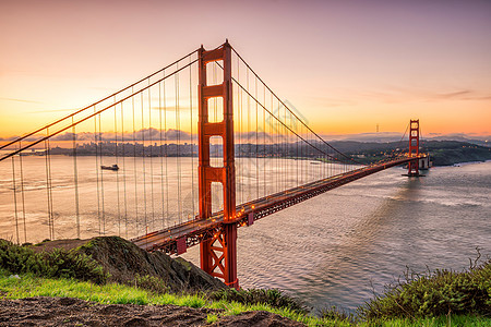 旧金山的金门大桥海岸蓝色天际旅行橙子游客天空建筑学历史性日落图片