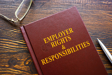 雇主权利和责任书和眼镜背景图片
