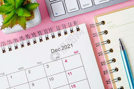 2021年12月的日历和备注本电脑网格商业日记键盘时间表桌子植物日程规划师平坦的高清图片素材