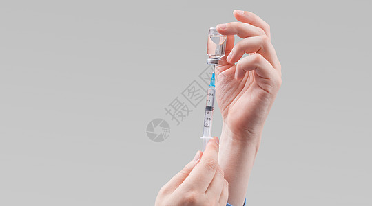 医生持有抗冠状病毒疫苗的毒物外科小瓶医院免疫注射器疾病药物科学护士疫苗图片