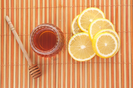 桌上的黄柠檬和蜂蜜图片