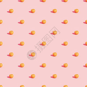 粉红色背景中的南瓜图案 用于秋季假期或 sales3d rende 广告蔬菜销售橙子褐色季节粉色桃色渲染3d工作室图片