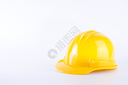 在白色背景的黄色安全帽 在白色隔绝的安全帽 安全设备概念 工人和工业主题生活建设者帽子危险工程师员工建筑师制造业塑料商业图片