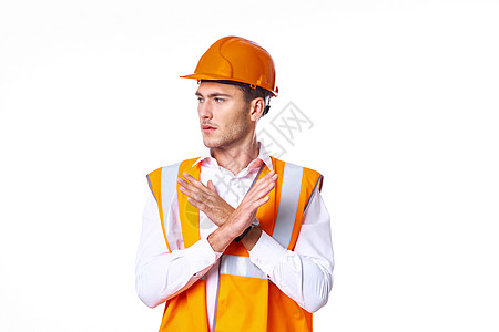 橙色建筑身穿橙色制服的男子工人装作建筑男性项目药片植物橙子建筑师承包商技术头盔工程师背景