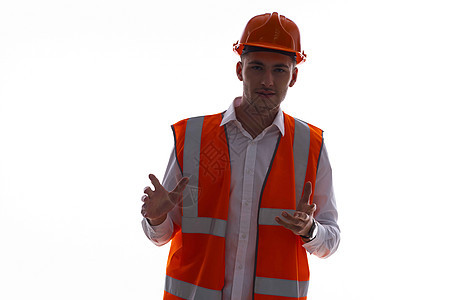 橙色统一制服职业轻背景的员工精神力工作者建筑师技术帽子商务工作经理成人男性人士商业图片