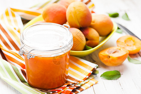 杏汁果酱食物饮食季节维生素橙子玻璃甜点桌子水果早餐图片