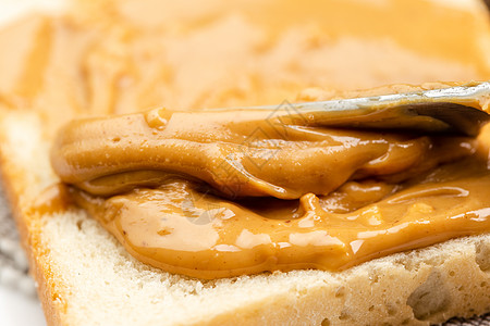 胡花生酱花生酱在吐司上传播小吃营养黄油食物面包过敏饮食早餐花生午餐图片