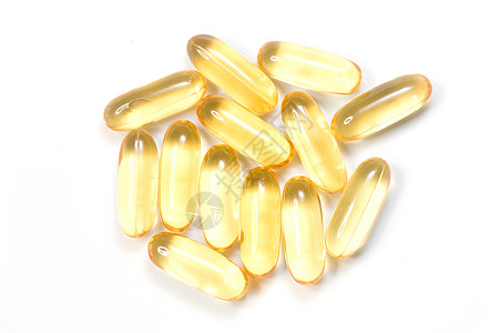 特写软凝胶胶囊中的金色油补充品 健康产品概念药片养分凝胶食物处方药品胶囊剂量药物饮食图片
