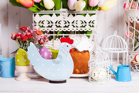 复活节鸡鸡庆典蓝色郁金香蛋糕传统圆点季节花朵风格鸟笼图片