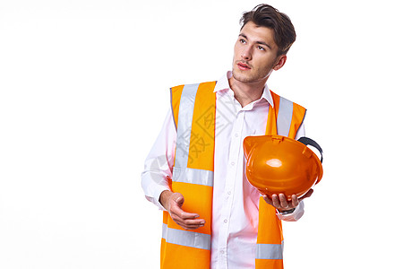 橙色建筑穿橙色背心的工程师 具有专业工作建设者专家建筑项目人士领班经理成人承包商工人背景