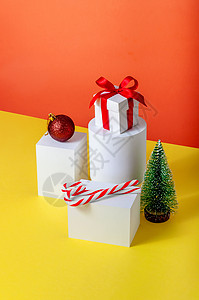 圣诞节场景不同几何学 Podiu 上的创意最小圣诞节概念丝带季节假期装饰风格场景盒子卡片桌子展示背景