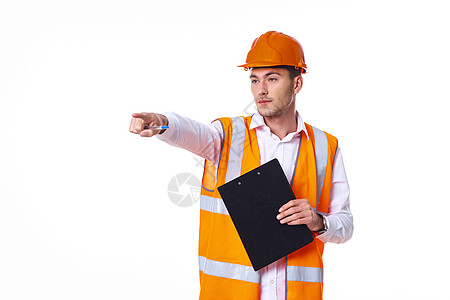 橙色建筑男性在橙色硬帽工程师工程中 从事职业建筑工作建设者建筑师安全技术帽子承包商成人男人安全帽背景
