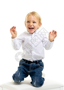 英俊的小男孩笑 快乐的童年的概念青年衬衫欢乐男性乐趣微笑笑声享受幸福幼儿园背景