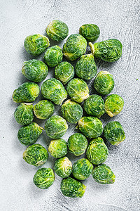 厨房桌上的绿色菜卷 白色背景 顶端视图等 冷冻布鲁塞尔沙拉黑色蔬菜发芽农业饮食植物营养桌子食物图片
