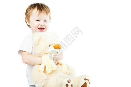 带大玩具熊的小女婴 可爱又可爱又滑稽的婴儿生活快乐玩具孩子们乐趣动物童年女性柔软度幸福图片